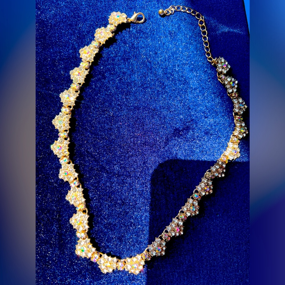 Gold tone rhinestone fits like a choker necklace